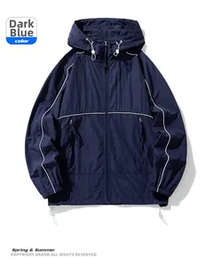 Detail of dark blue sun protection jacket featuring reflective white safety strips
