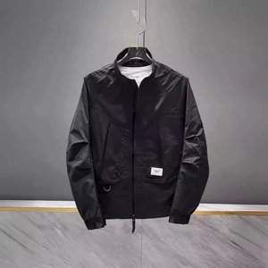 Men's black casual lightweight jacket with stand collar and minimalist pocket detail