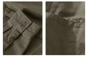 Detailed macro view of olive green shirt sleeve cuffs and reinforced pocket stitching