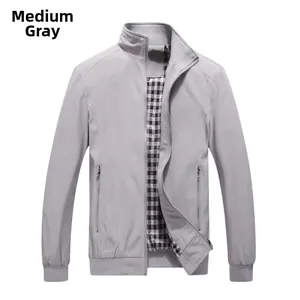 Detail of medium grey standing collar jacket featuring premium plaid lining and ribbed cuffs