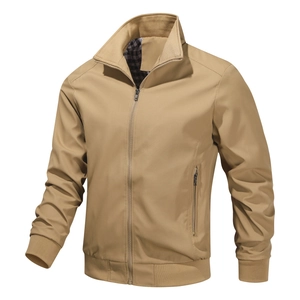 Detail view of khaki stand collar jacket with checkered lining and ribbed cuffs