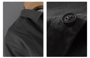 Detailed close-up of charcoal gray men shirt featuring matte black buttons and neat stitching