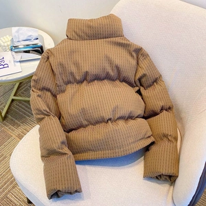 Short brown stand-collar jacket with unique wave-textured 3D pattern for women