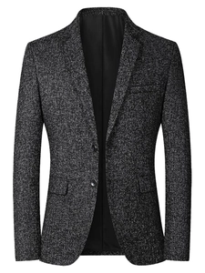 Detailed close-up of slim fit men's blazer featuring textured gray fabric and classic buttons