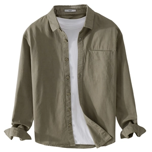 Army green long sleeve work shirt with white t-shirt underlay in a flat lay view