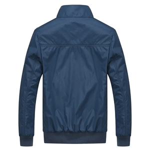Men's navy blue windproof bomber jacket with ribbed cuffs and stand collar, back view