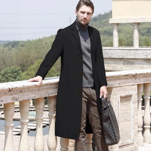 Classic men's long black wool coat with three buttons and notch lapel in business style