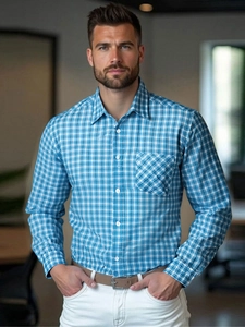 Detailed view of long-sleeve blue plaid business casual shirt with chest pocket