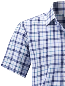 Close-up of the collar and shoulder stitching on a blue checkered short-sleeved shirt