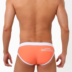Rear view of orange men's swim briefs with white trim and printed brand logo on back