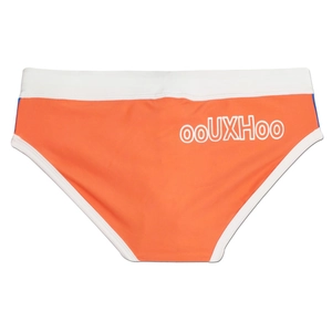 Detail of color-block swim briefs with elastic waistband and brand logo print
