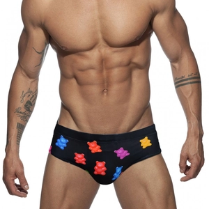 Men's black swim briefs with colorful gummy bear prints and slim fit design