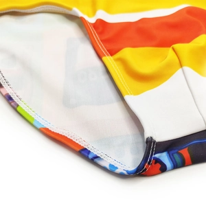 Detailed view of swimwear featuring retro stripe patterns and high-quality stitching