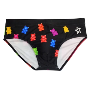 Detail of black swim briefs featuring colorful gummy bear patterns and white star graphic