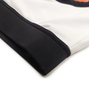 Detail of white breathable mesh fabric with high-quality stitching on men's swim briefs