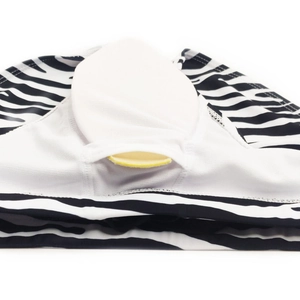 Detail view of zebra print men's swim briefs showing the inner pocket and yellow cup liner