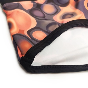 Close-up of abstract coffee fluid pattern on quick-dry stretch men swim trunks