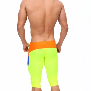 Detail of men's quick-dry sport swim trunks showing elastic color-block back design