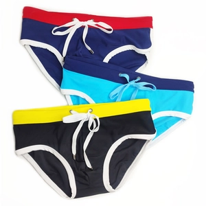 Three-pack of men's quick-dry swim briefs featuring contrast trim and drawstring waist