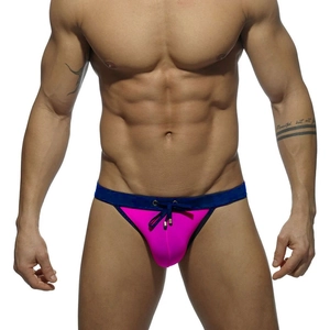 Close-up of men's sexy pink bikini swimwear with navy waistband and adjustable drawstring