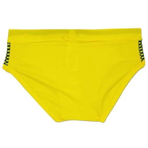 Detail view of yellow swim briefs featuring black and green geometric side stripes