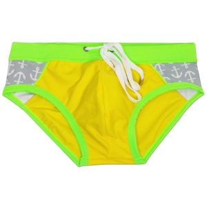 Detail of yellow mens swim briefs featuring nautical anchor print and metal tip drawstrings