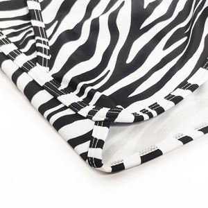 Detail view of double-stitched seam on black and white zebra pattern quick-dry fabric