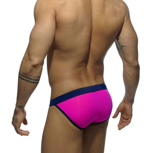 Rear view of high-cut men's swim briefs in bright pink and navy blue contrast colors