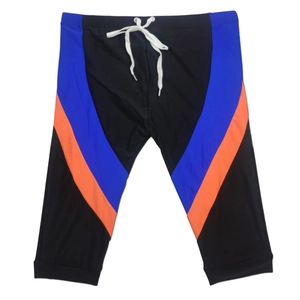 Detail of quick-dry swim trunks with elastic waist, drawstring, and contrast stripes