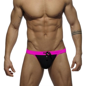 Detail of men's low waist swim briefs with pink waistband and black drawstring closure