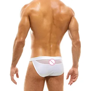 Detailed back view of men's low-waisted white swim briefs with breathable mesh paneling