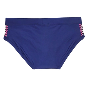 Detailed side view of navy swim briefs with athletic pink and white polka dot pattern