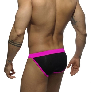 Rear view of men's low-rise swim briefs featuring bold black and neon pink contrast trim