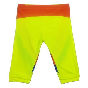 Close-up of fluorescent yellow sports leggings with orange waistband and blue detailing