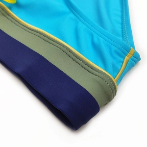 Detail of color-block swim briefs with reinforced stitching and premium stretch fabric