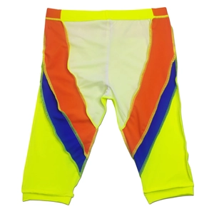 Detail of color-block athletic swim shorts featuring neon yellow, orange, and blue panels