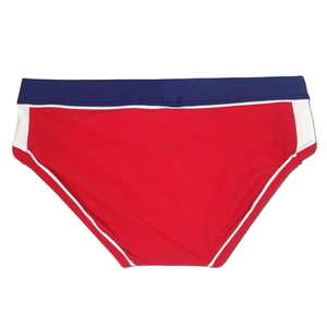 Detail view of men's low-rise elastic swim briefs with red, blue and white color-block design