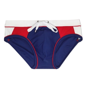 Detail of classic men's tricolor swimwear featuring elastic waistband and adjustable drawstrings