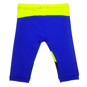 Detail of blue and yellow quick-dry professional swim trunks with elastic waistband