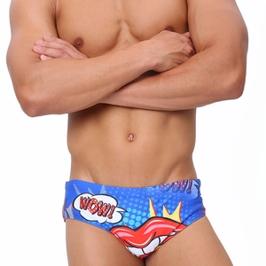 Detail of men's low-rise blue swim briefs featuring pop art lip print and WOW text