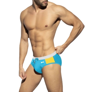 Men's sky blue athletic swim briefs with white drawstring and Argentina flag patch