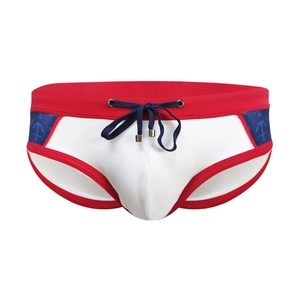 Men's sexy color-block swim briefs with red waist, white front, and blue anchor print