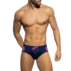 Navy blue men's swim briefs with pink drawstring and polka dot side panel detail