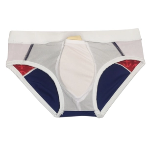 Detail of color-block swim briefs featuring white 3D pouch and red anchor pattern print