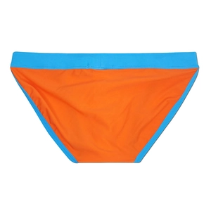 Detail view of men's quick-dry swim briefs in bright orange and blue color-block design