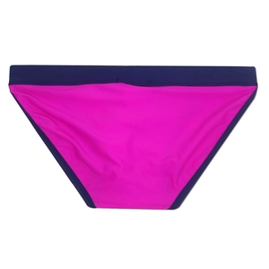 Detail of color-block high-cut swim briefs featuring blue waistband and pink fabric