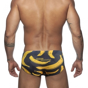 Maillot de bain homme noir avec imprimé bananes jaunes, vue arrière ajustée et tendance