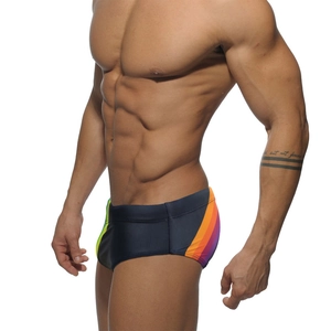 Detailed side view of men's athletic bikini swim briefs with colorful rainbow side stripes