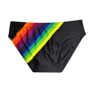 Detail of black swim briefs with side rainbow stripes and high-stretch elastic fabric