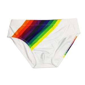 Detailed view of white men's swim briefs featuring rainbow stripes and elastic waistband